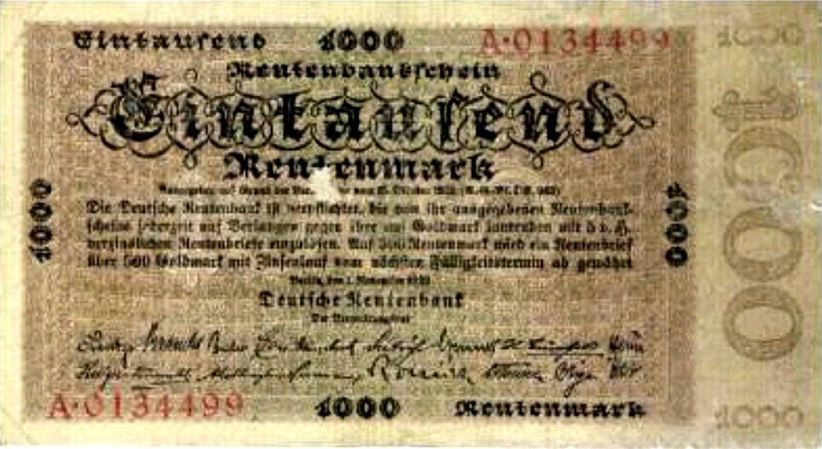 Brauner Geldschein: Rentenbankschein, groß Eintausend Rentenmark, darunter der Text der Deutschen Rentenbank, rote Kontrollnummern und Unterschriften
