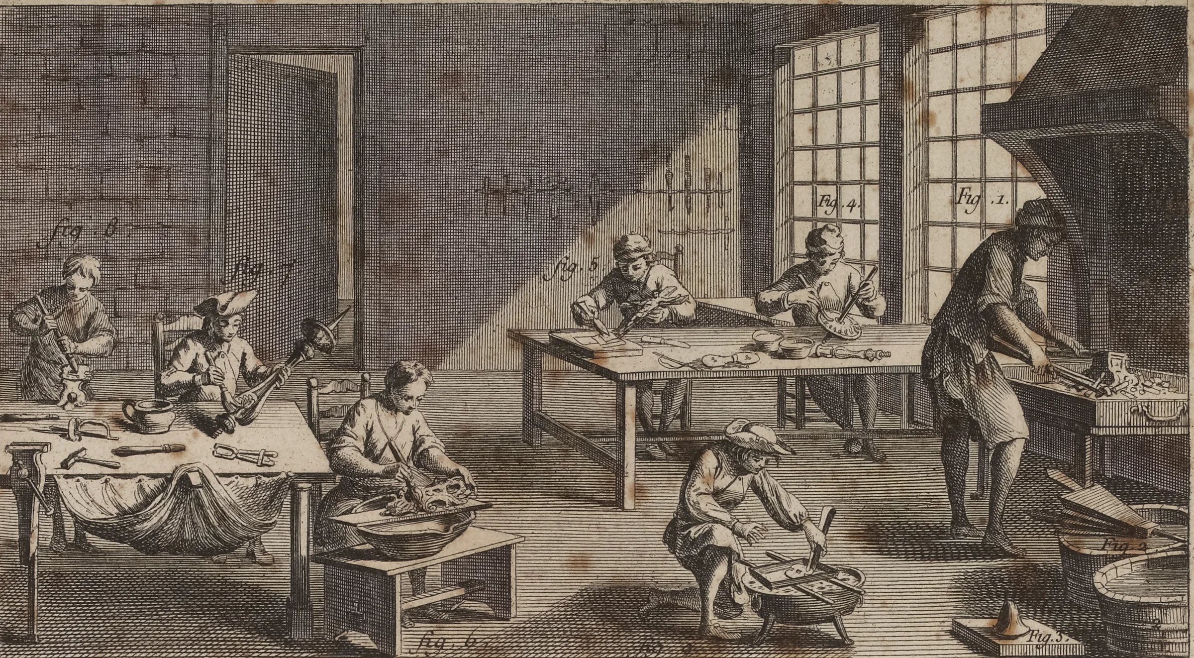 Engraving of a workshop: people at tables and at a hearth under a chimney hood, light falls through tall windows.