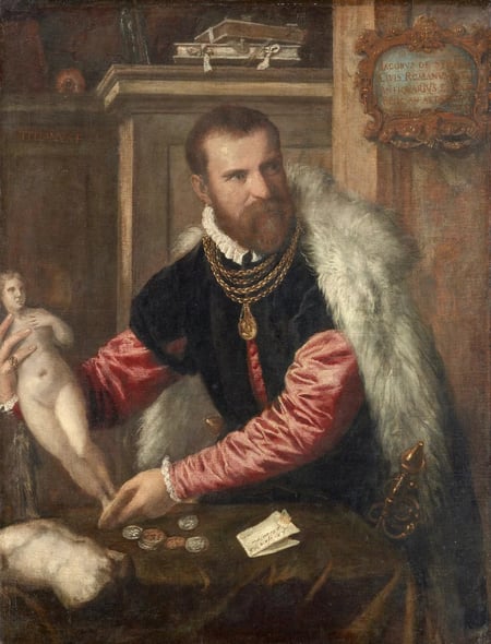 Gemälde: Jacopo Strada im pelzbesetzten Mantel mit goldener Kette hält eine kleine Statue, vor ihm auf dem Tisch liegen Münzen und ein Brief