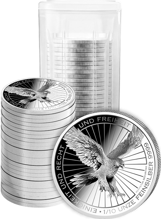 Tubo transparente para monedas, delante una pila de monedas de plata y un Deutscher Adler suelto