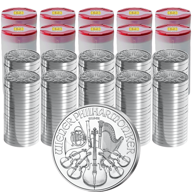 Coin tubes with silver Wiener Philharmoniker coins, a single coin in front of them