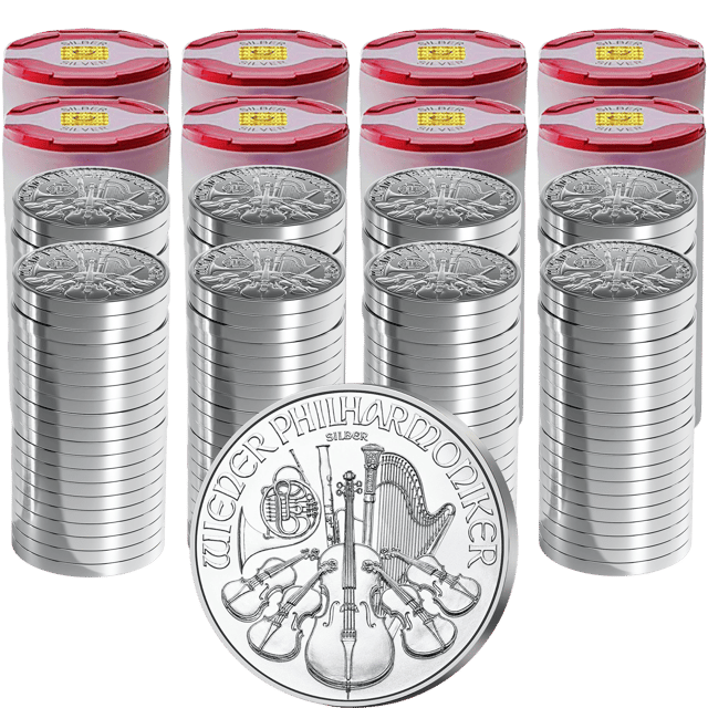 Coin tubes with silver Wiener Philharmoniker coins, a single coin in front of them
