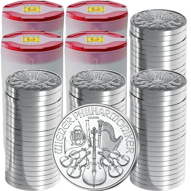 Coin tubes with silver Wiener Philharmoniker coins, a single coin in front of them