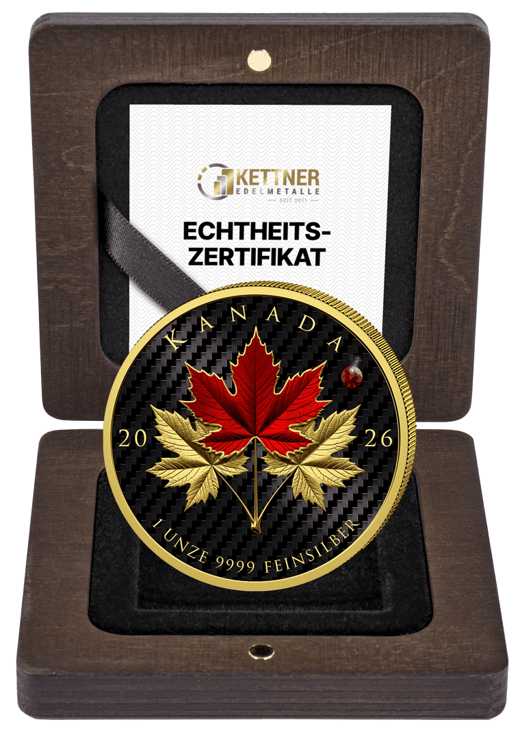 Die Münze in einem dunklen Holzetui mit Echtheitszertifikat